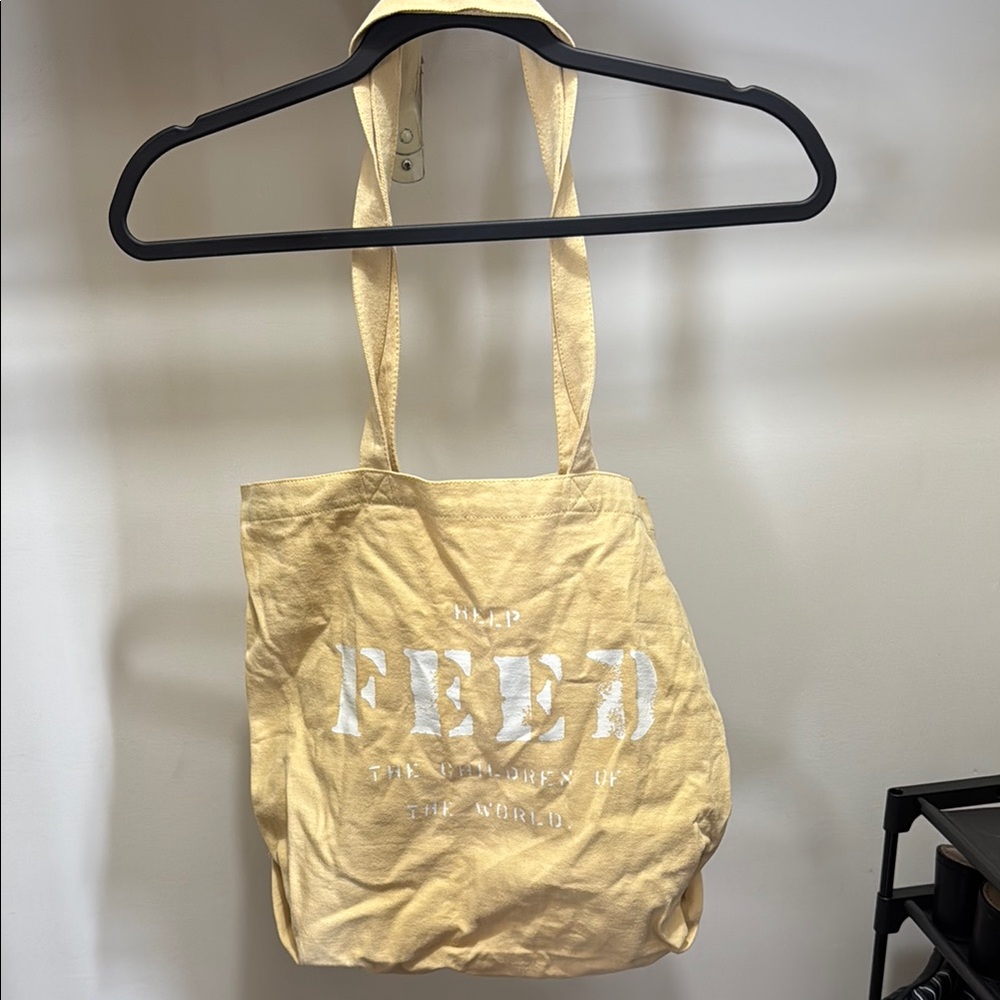 Yellow FEED Tote Bag
